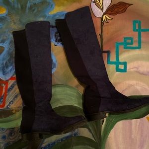 Knee high fitting boots